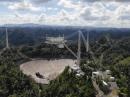 The damaged Arecibo Observatory 305-meter dish.